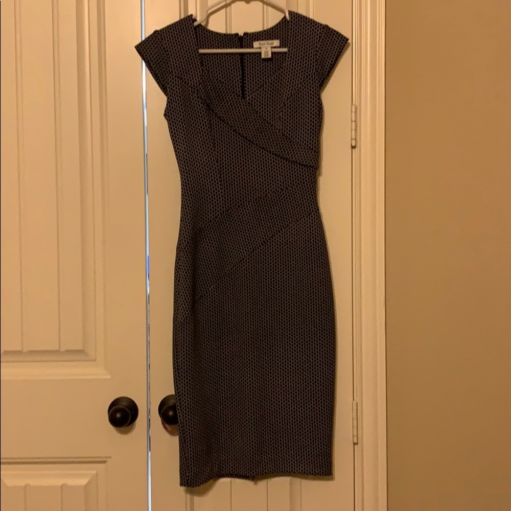 Gently loved fitted dress, great design and fit!
